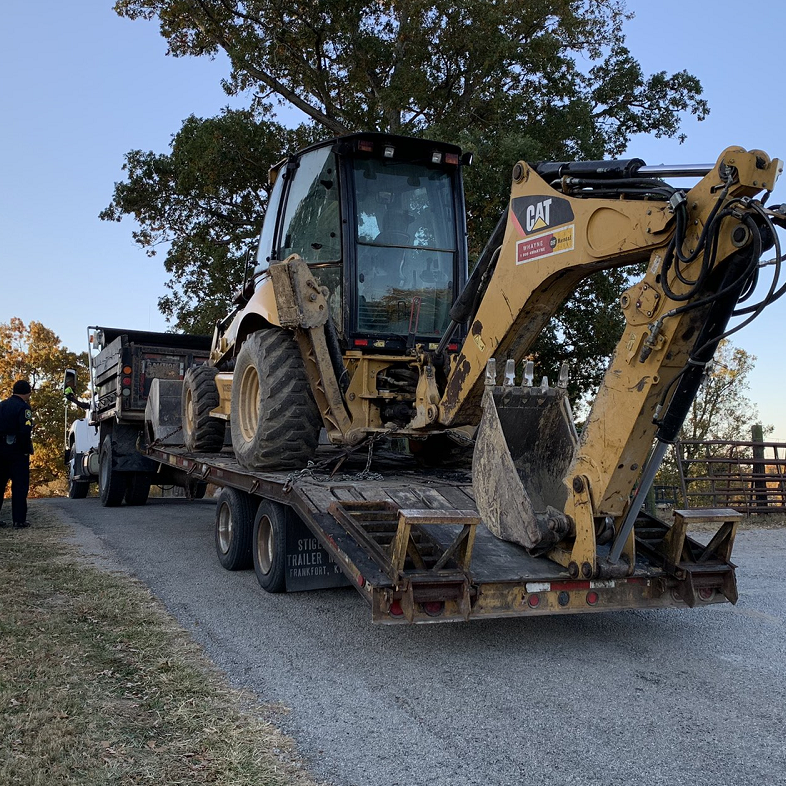 Backhoe arrives at Houck farm in Bardstown